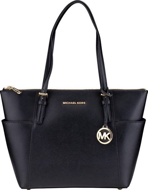 michael michael kors jet set travel schoudertas black|michael kors airplane purse.